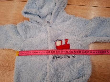 Chlpatučký overal, 74