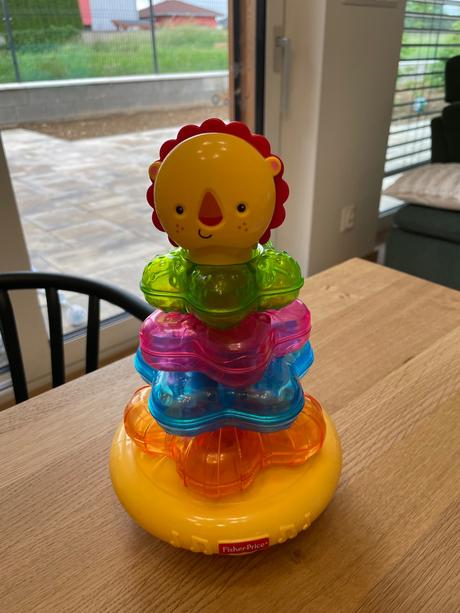 Hudobná navliekačka fisher price,