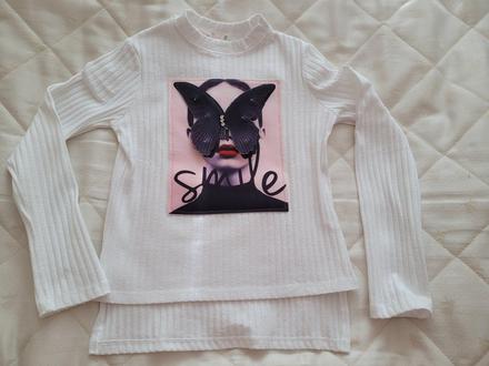 Teplejšie tričko, 128