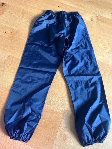 Detske nohavice do dazda, decathlon,134