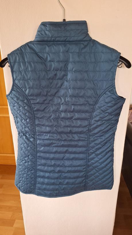 Jazdecká vesta, 164