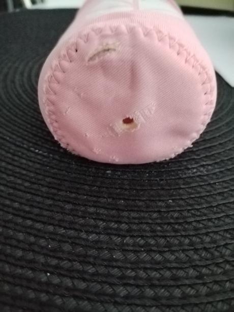 Sklenená fľaša s obalom,