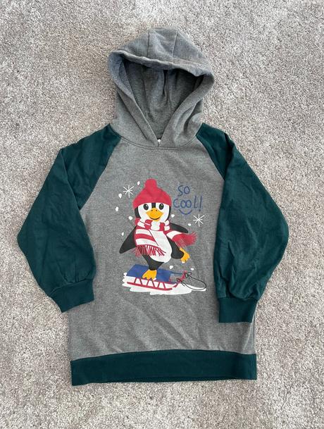 Mikina s tučniakom, 116