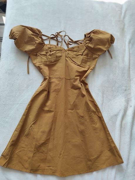 Balík oblečenia zeny, s