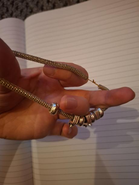 Strieborný náramok s príveskami, 