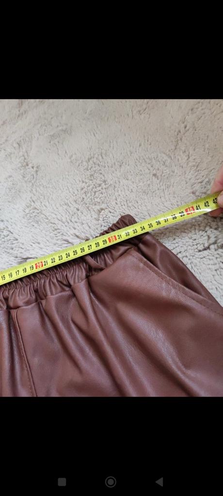 Dámska koženkova sukňa, 