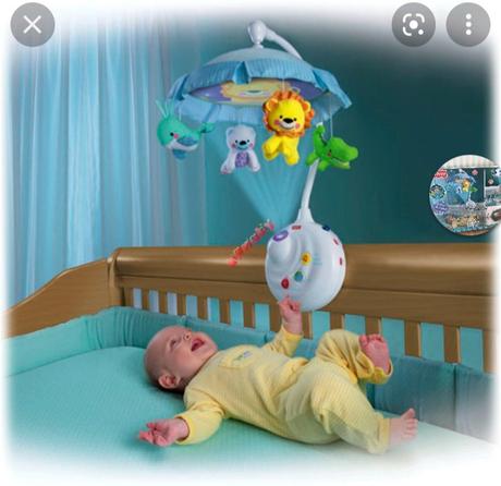 Kolotoc s projektorom a hudbou,nad postieľku,