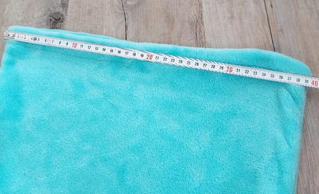 Flisová deka v tvare plutvy,