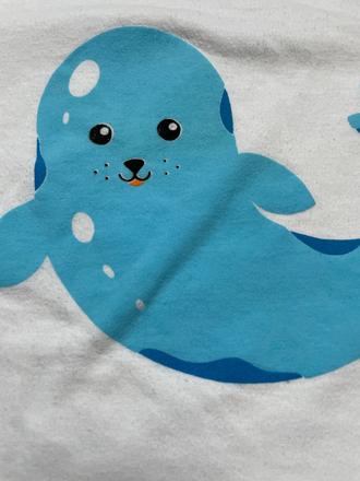 Tričko s tuleňom, 116
