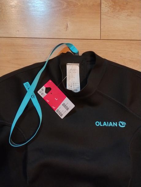 Dámska šortkova kombinéza na surf,