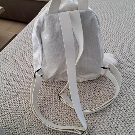 Blikajúci ruksak minie, 