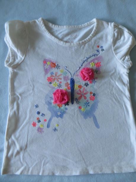 Biele tričko s motýľom, 104