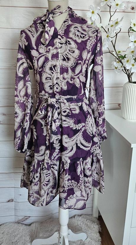 Krásne lahulinké šaty, 38