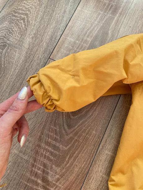 Kombinéza do dažďa, 92