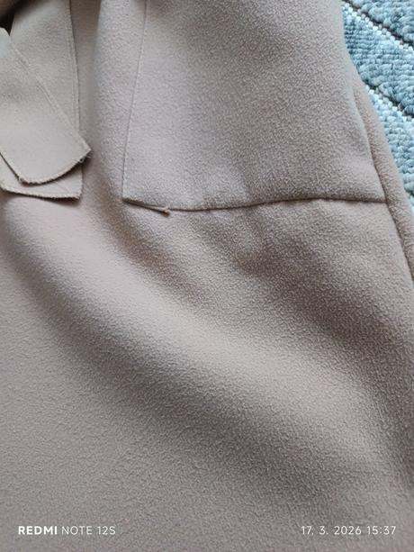 Prechodný kabát, 38