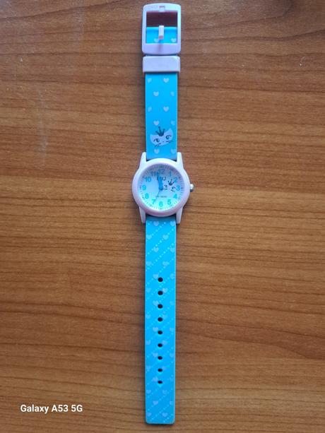 Hodinky s macickou zn.q / q, 