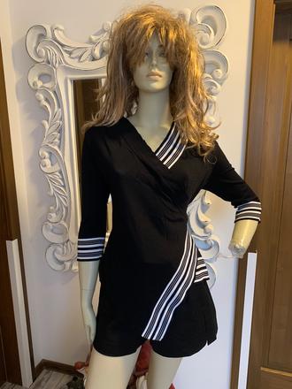 Asymetricky svetrik, 42