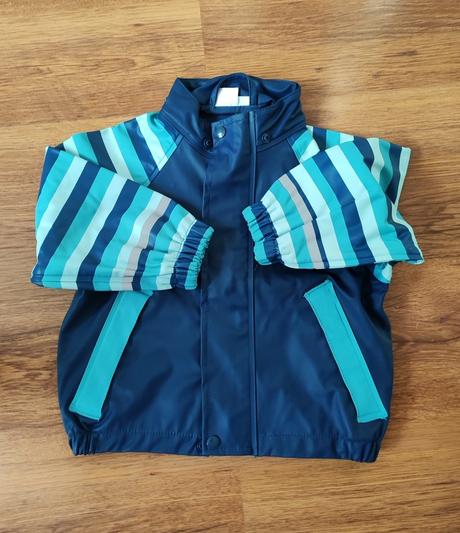 Pogumovaná bunda, 74