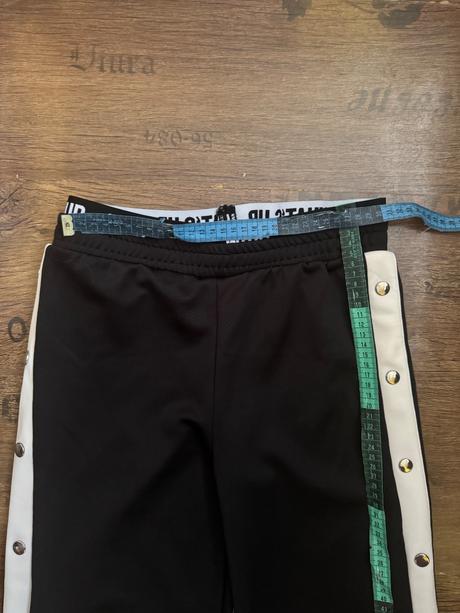 Čierne tepláky s cvokmi, takko,146