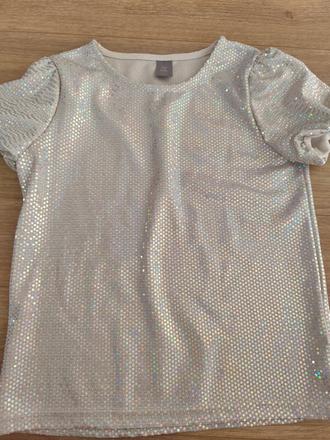 Trblietavý top, 134