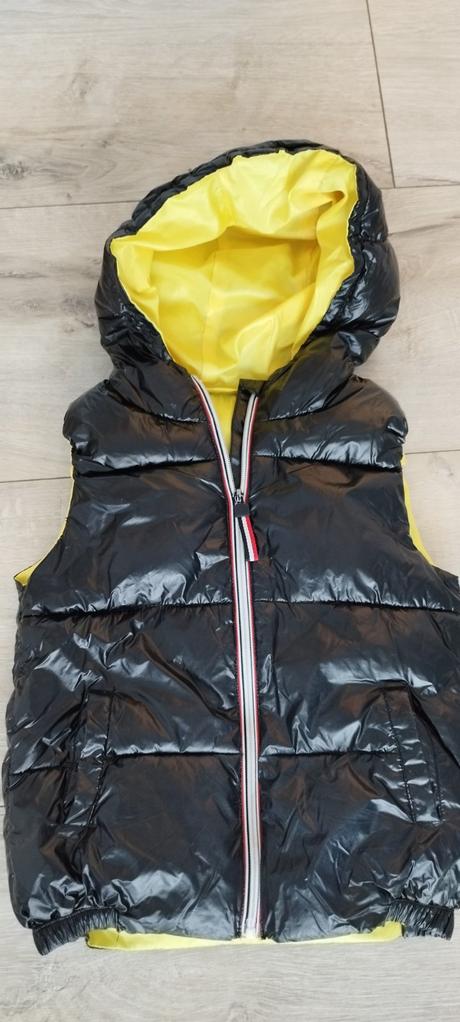 Čierna lesklá vesta, 98