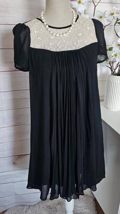 Pekné lahulinké šaty, 38