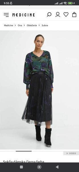 Ako zladiť čiernu sukňu do kancelárie?