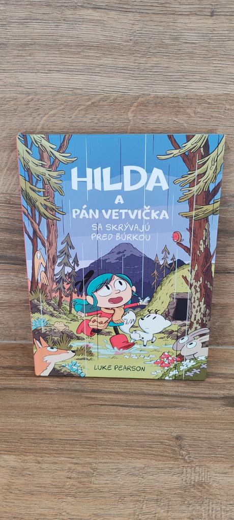 Hilda a pán vetvička sa skrývajú pred búrkou, 