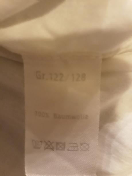 Saty s bohatou spodnickou, 122