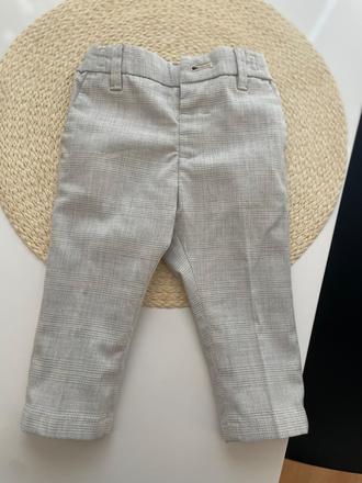 Elegantne nohavice s pukmi, 74