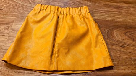 Koženková sukňa, 134