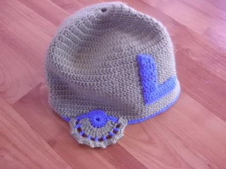 Hackovana ciapka s pismenom l, 98