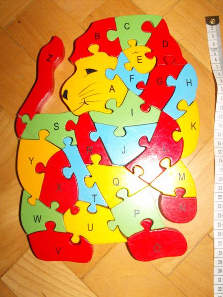 Drevený puzzle lev,