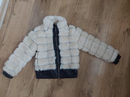 Chlpatá bundička, 98