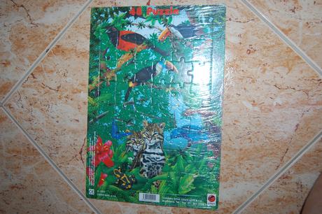 Puzzle papagáje a šelmy,