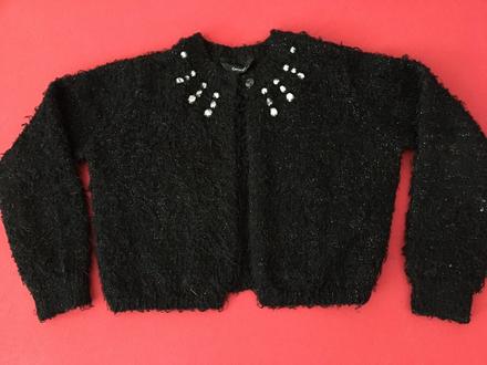 Slávnostný svetrík, 122