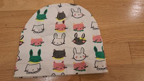 Čiapka so zajačikmi, 56