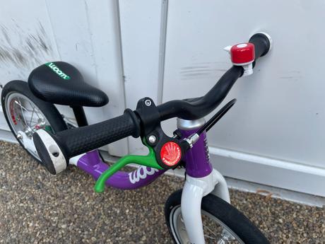 Woom 1 fialový,