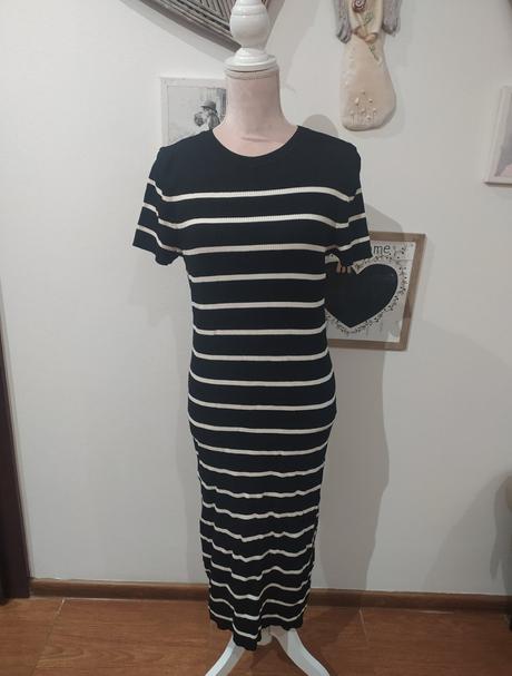 Svetríkove šaty, l