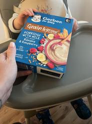 GERBER mliečna kaša pšenično-ovsená banán a malina 200 g
