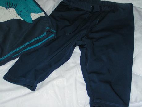 Plavkové tričko, 122