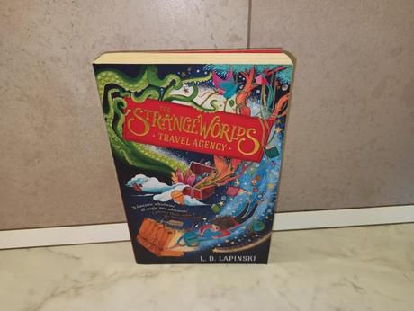 L d lapinski - the strange worlds travel agency,