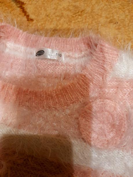 Chlpatý pulóver, 110