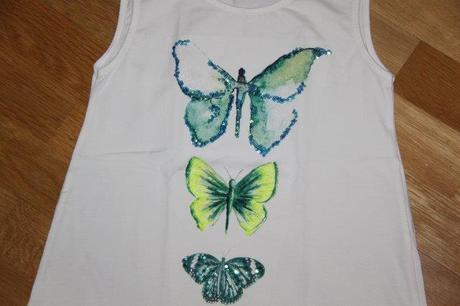 Tunika s motýlikmi, 140