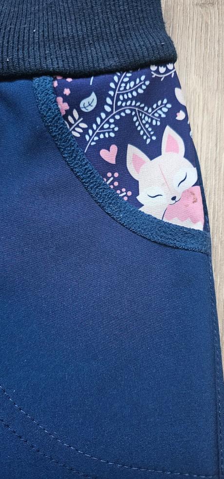 Softshellové nohavice, 104