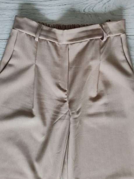 Predám elegantné nohavice pre 9-10r., 152