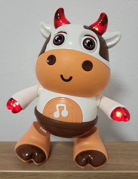 Tancujúca kravička so svetelnými efektami, 