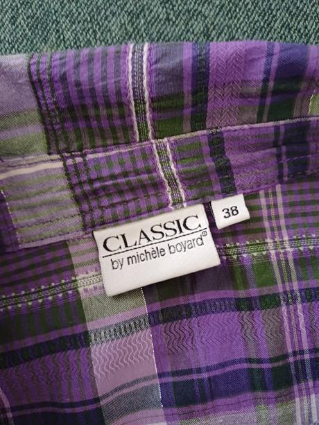 Fialová košeľa, 38