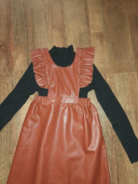 Koženkove šaty, 116