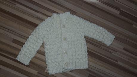 Novorodenecký svetrík, 56